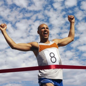 Man Running Reaching Finish Line