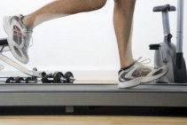 A treadmill mat reduces noise and protects your floor. Photo Credit BananaStock/BananaStock/Getty Images